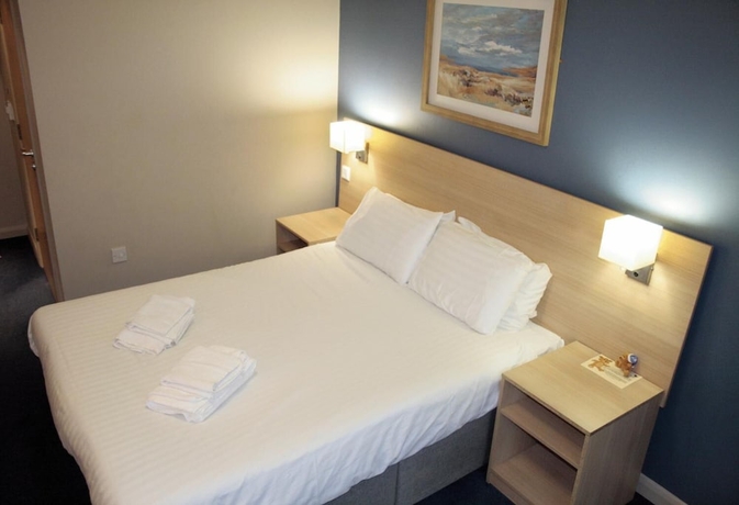 Imagen de la habitación del Hotel The Welcome Inn. Foto 9
