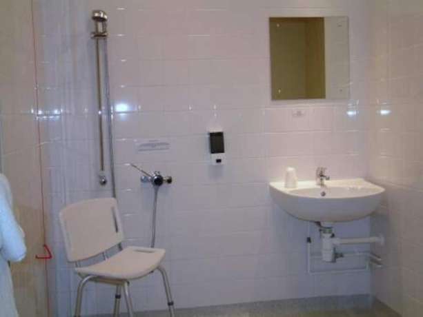 Imagen de la habitación del Hotel The Welcome Inn. Foto 14