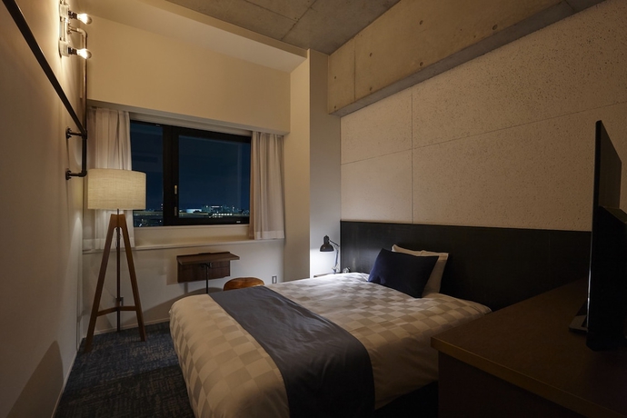 Imagen de la habitación del Hotel The Well-hub Haneda. Foto 9