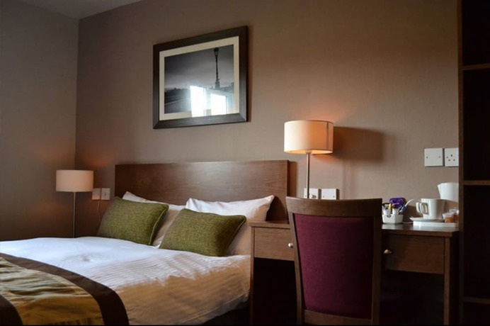 Imagen de la habitación del Hotel The Wellington Hotel by Greene King Inns. Foto 6