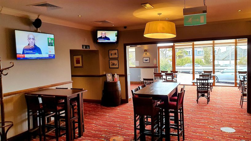 Imagen del bar/restaurante del Hotel The Wellington Hotel by Greene King Inns. Foto 3