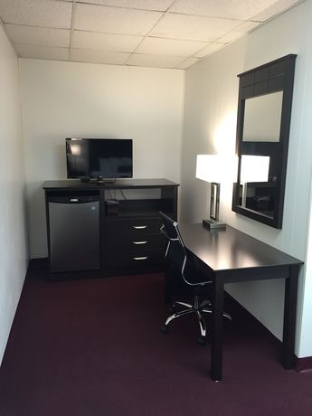 Imagen de la habitación del Hotel The Wellington and Suites Oceanblock. Foto 6