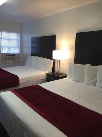 Imagen de la habitación del Hotel The Wellington and Suites Oceanblock. Foto 15