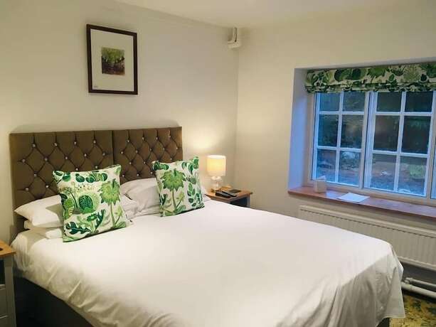 Imagen de la habitación del Hotel The West Arms. Foto 16