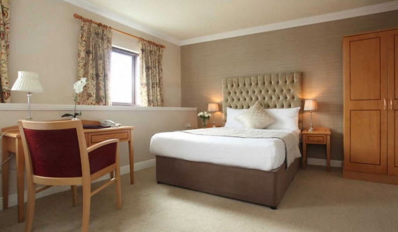 Imagen de la habitación del Hotel The Western. Foto 5