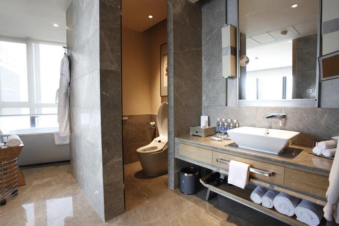 Imagen de la habitación del Hotel The Westin Chongqing Liberation Square. Foto 10