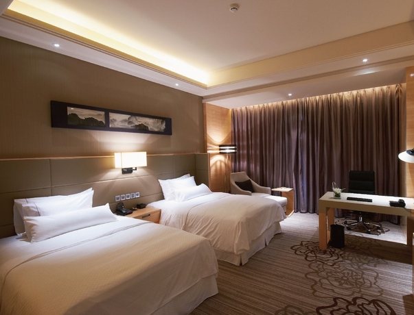 Imagen de la habitación del Hotel The Westin Fuzhou Minjiang. Foto 10