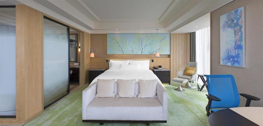 Imagen de la habitación del Hotel The Westin Qingdao. Foto 4