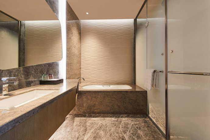 Imagen de la habitación del Hotel The Westin Qingdao West Coast. Foto 14