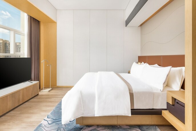 Imagen de la habitación del Hotel The Westin Wuhan Hanyang. Foto 13