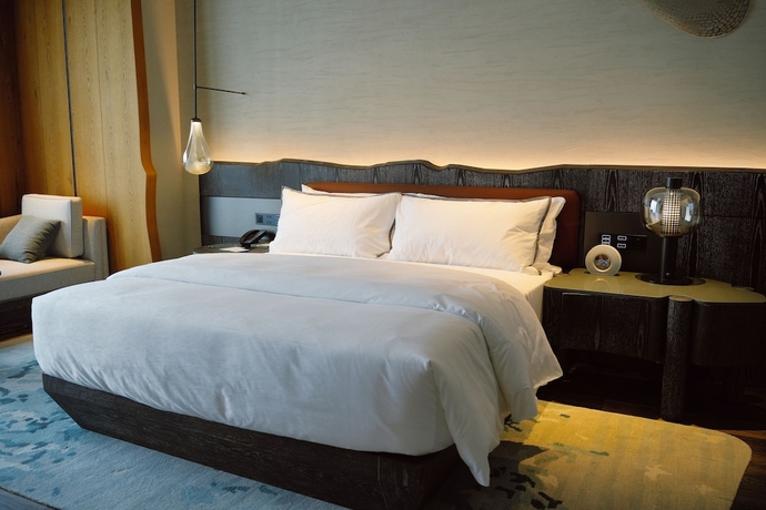 Imagen de la habitación del Hotel The Westin Yantai. Foto 9