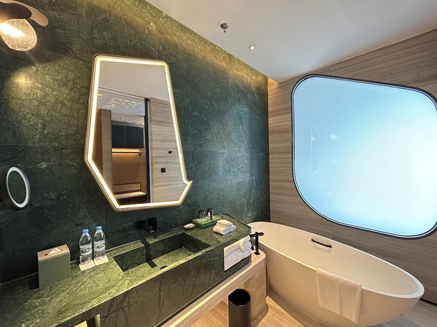 Imagen de la habitación del Hotel The Westin Yantai. Foto 17