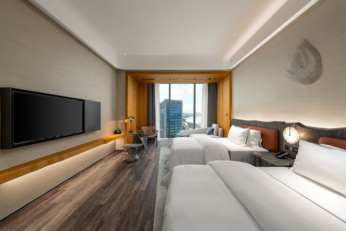 Imagen de la habitación del Hotel The Westin Yantai. Foto 18