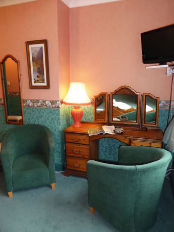 Imagen de la habitación del Hotel The Westings. Foto 8