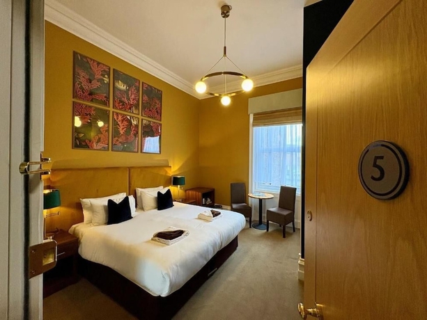 Imagen de la habitación del Hotel The Weston. Foto 4