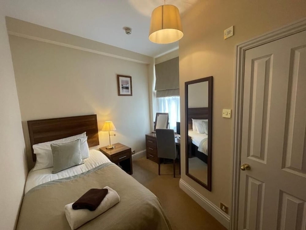 Imagen de la habitación del Hotel The Weston. Foto 9