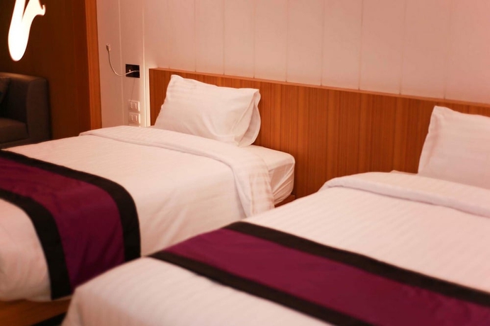Imagen de la habitación del Hotel The Whisper. Foto 8