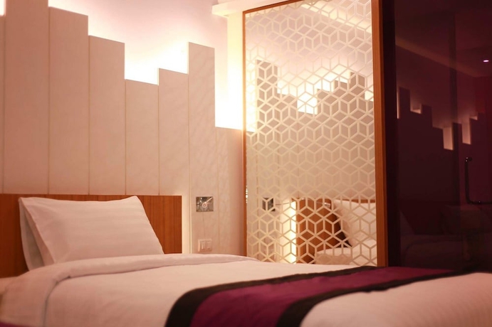 Imagen de la habitación del Hotel The Whisper. Foto 10