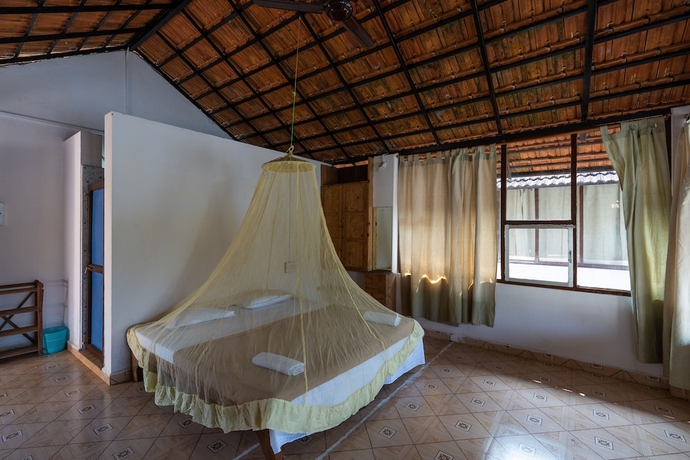 Imagen de la habitación del Hotel The Whispering Lake Resorts. Foto 2