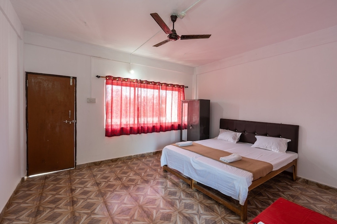 Imagen de la habitación del Hotel The Whispering Lake Resorts. Foto 3
