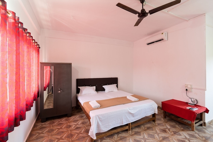 Imagen de la habitación del Hotel The Whispering Lake Resorts. Foto 4