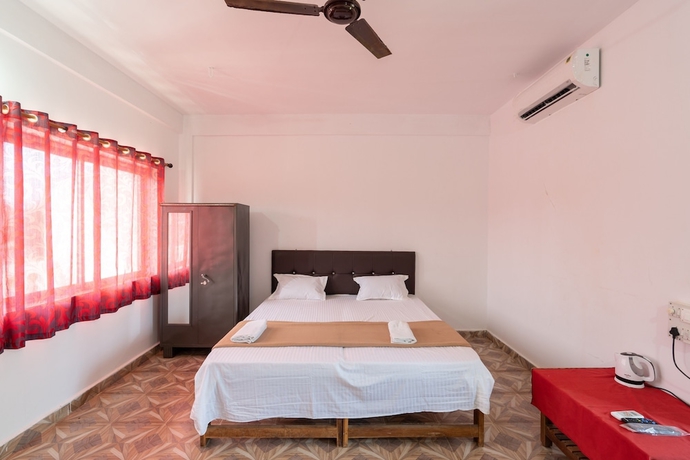 Imagen de la habitación del Hotel The Whispering Lake Resorts. Foto 5