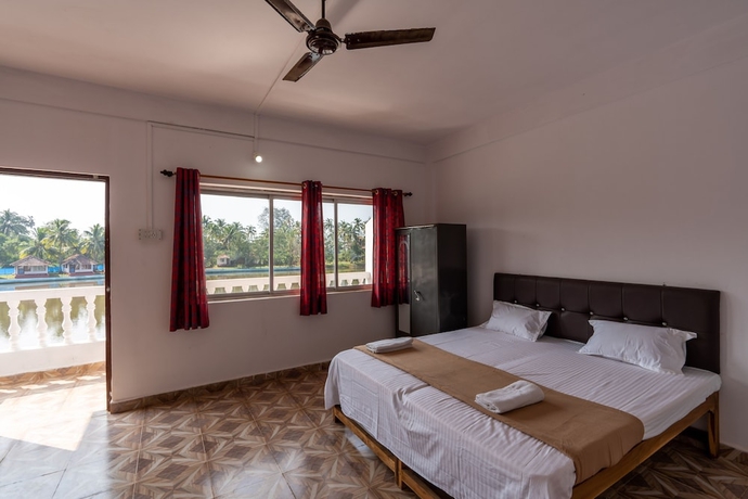 Imagen de la habitación del Hotel The Whispering Lake Resorts. Foto 6