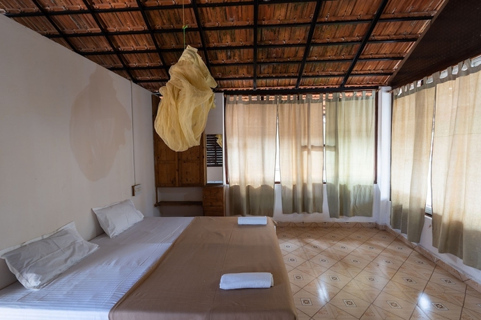 Imagen de la habitación del Hotel The Whispering Lake Resorts. Foto 10