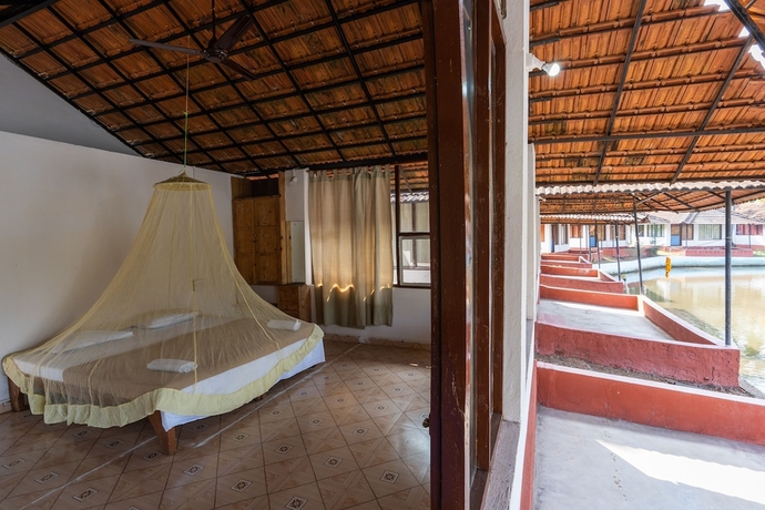 Imagen de la habitación del Hotel The Whispering Lake Resorts. Foto 11