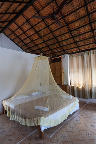 Imagen de la habitación del Hotel The Whispering Lake Resorts. Foto 12