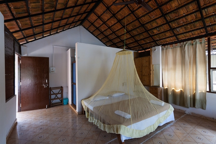 Imagen de la habitación del Hotel The Whispering Lake Resorts. Foto 13