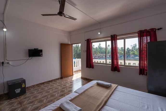 Imagen de la habitación del Hotel The Whispering Lake Resorts. Foto 14