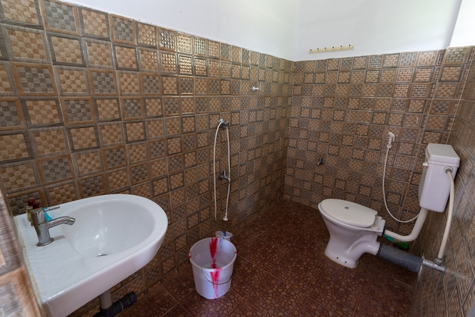 Imagen de la habitación del Hotel The Whispering Lake Resorts. Foto 16