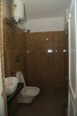 Imagen general del Hotel The Whispering Pine And Suites. Foto 5