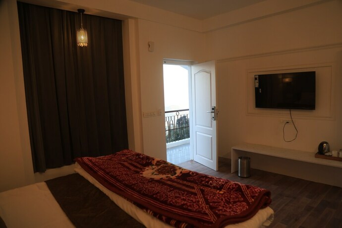 Imagen general del Hotel The Whispering Pine And Suites. Foto 7