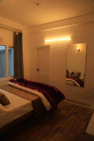 Imagen general del Hotel The Whispering Pine And Suites. Foto 11