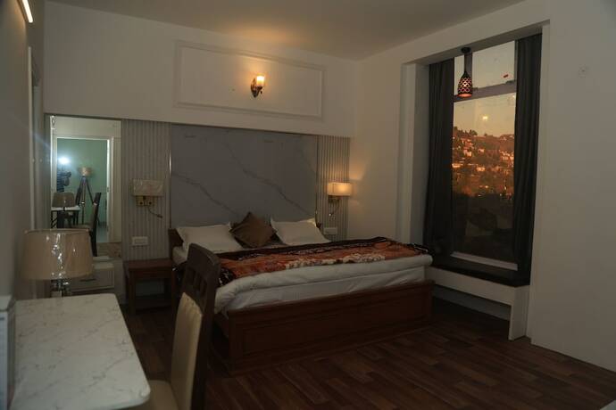 Imagen general del Hotel The Whispering Pine And Suites. Foto 12