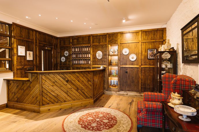 Imagen de los interiores del Hotel The Whispering Pine Lodge. Foto 20