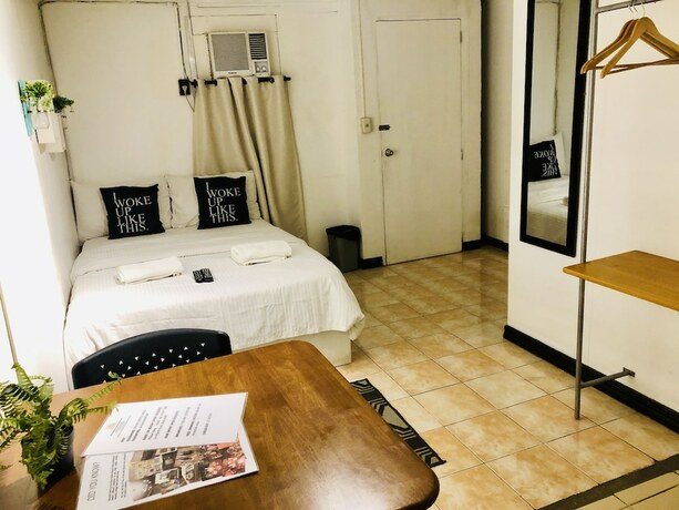 Imagen de la habitación del Hotel The White BandB Bacolod. Foto 11
