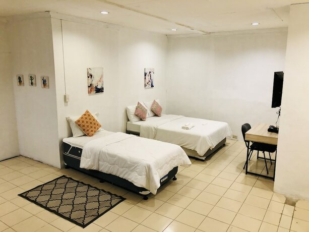 Imagen de la habitación del Hotel The White BandB Bacolod. Foto 12