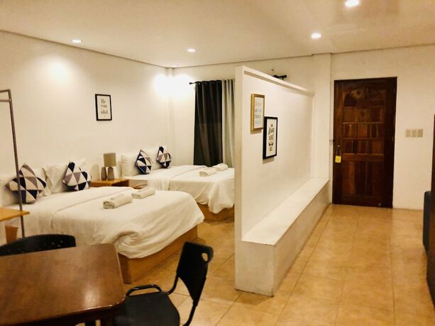 Imagen de la habitación del Hotel The White BandB Bacolod. Foto 13