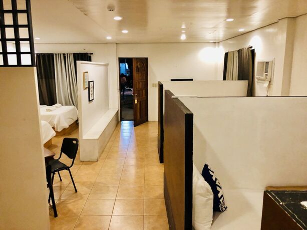 Imagen de la habitación del Hotel The White BandB Bacolod. Foto 14