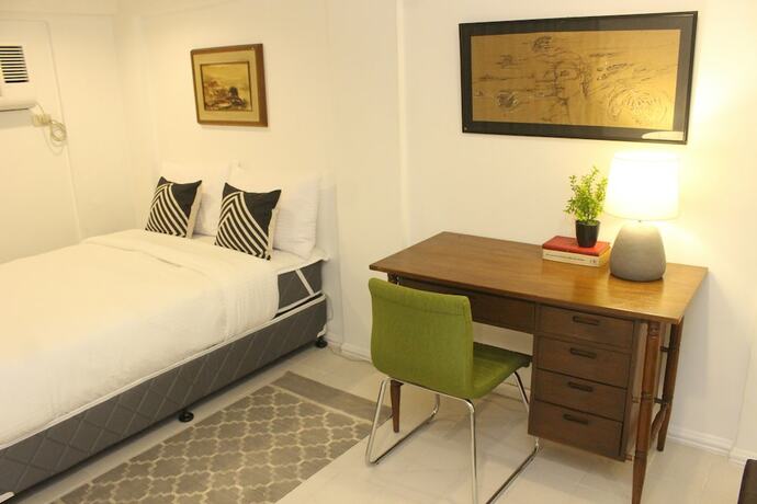 Imagen de la habitación del Hotel The White BandB Bacolod. Foto 16