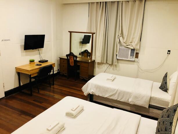 Imagen de la habitación del Hotel The White BandB Bacolod. Foto 17