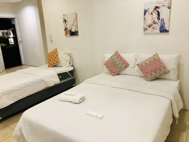 Imagen de la habitación del Hotel The White BandB Bacolod. Foto 19