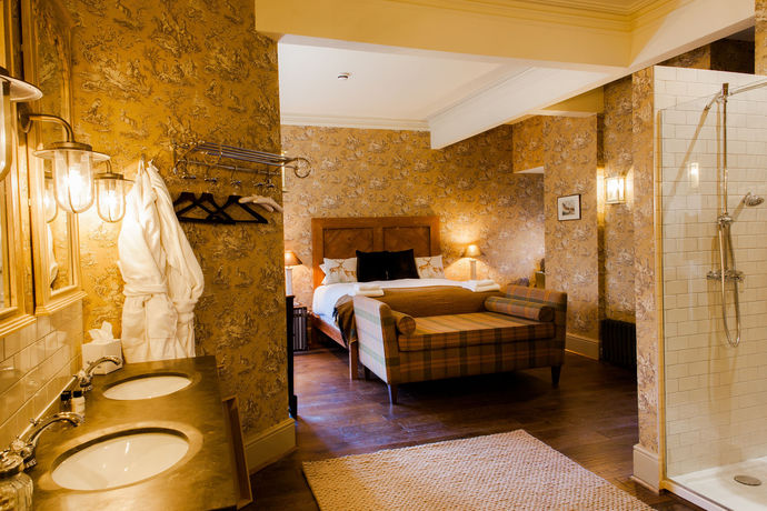 Imagen de la habitación del Hotel The White Buck. Foto 9
