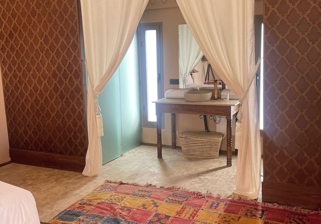 Imagen de la habitación del Hotel The White Camel Lodge. Foto 16