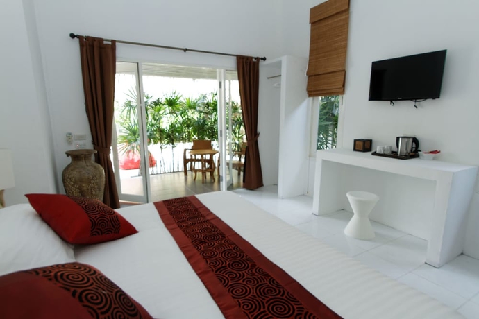 Imagen de la habitación del Hotel The White Cottage. Foto 2