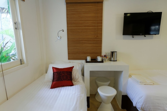 Imagen de la habitación del Hotel The White Cottage. Foto 4