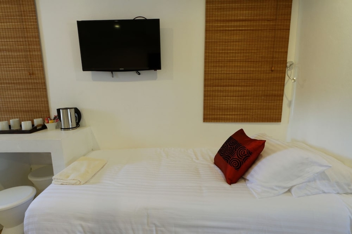 Imagen de la habitación del Hotel The White Cottage. Foto 10